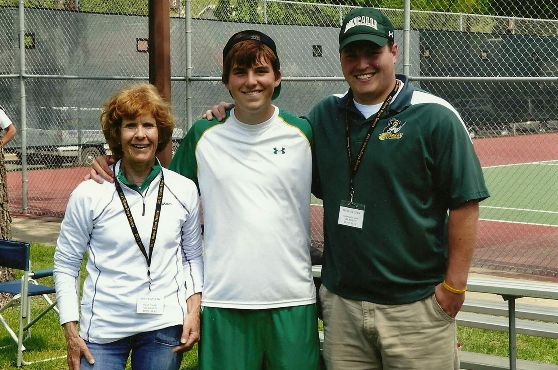 Coach Judy with player Jared Carrels and assistant coach Mike Zerr